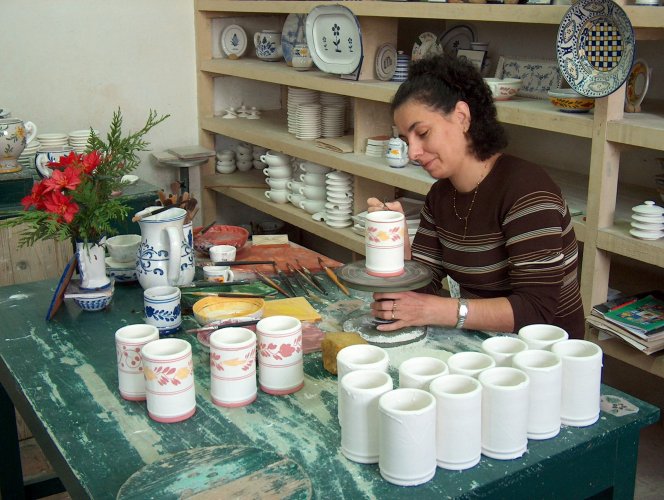 Painting the ceramic pottery